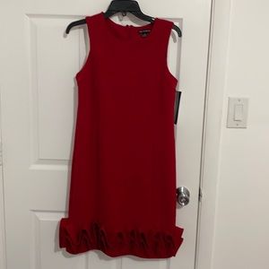 Red, sleeveless midi dress by Nina Leonard.